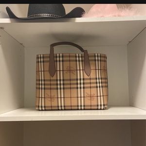 Reversible - double sided . Other side is mauvy pink . Almost new